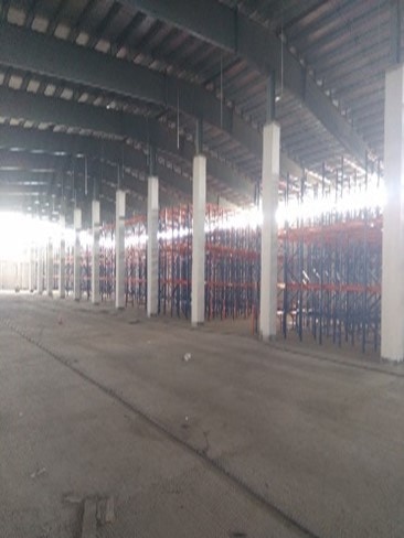 Interior of the Payra Port warehouse with racking installed along both walls